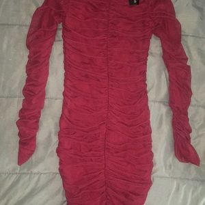 I am selling this burgundy body con dress